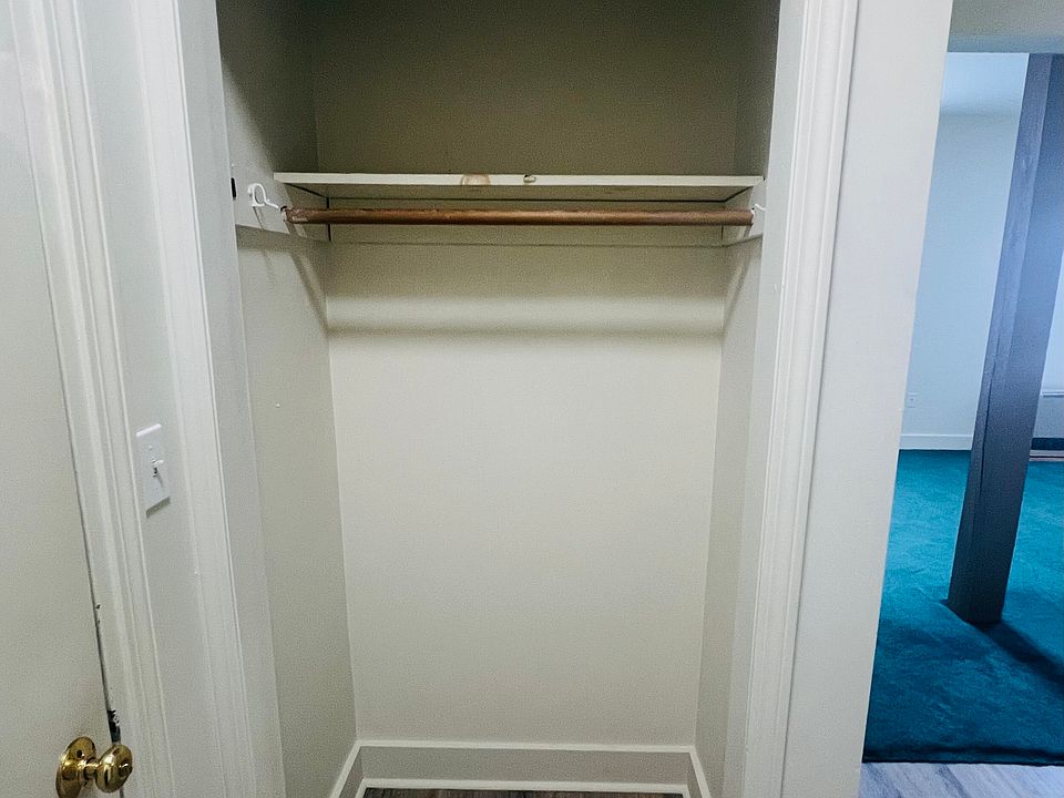 Coat closet new doors being installed.