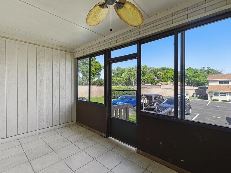 view of the parking lot from the downstairs porch
