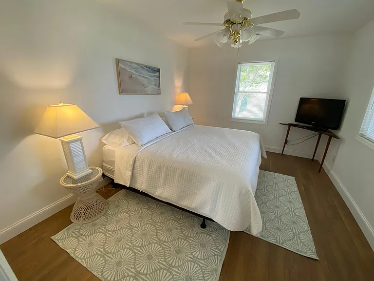One of the 3 bedrooms upstairs with a king bed
