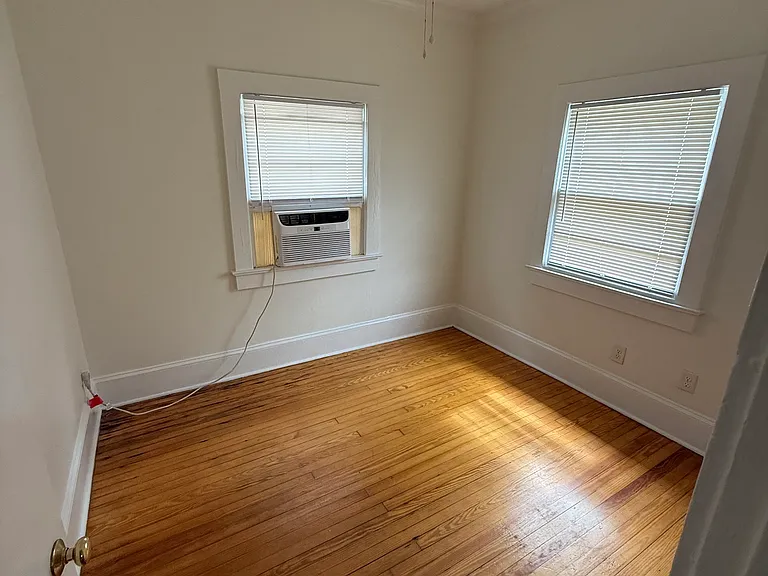 Second bedroom in the back of the house, view from the door.