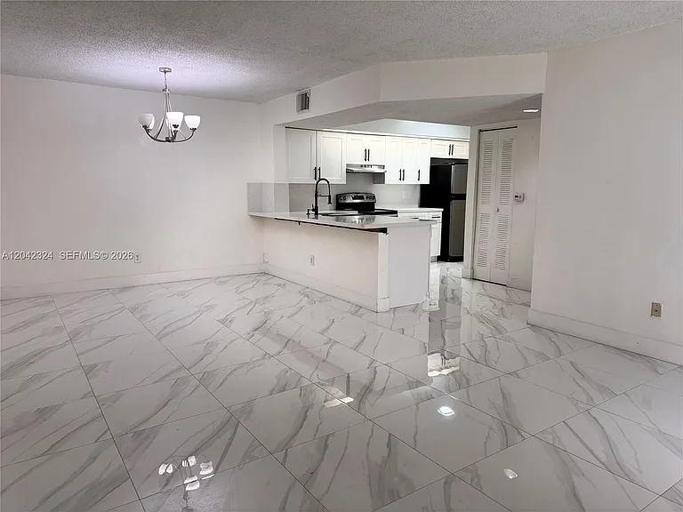 18830 NW 57th Ave #106 — Photo 1