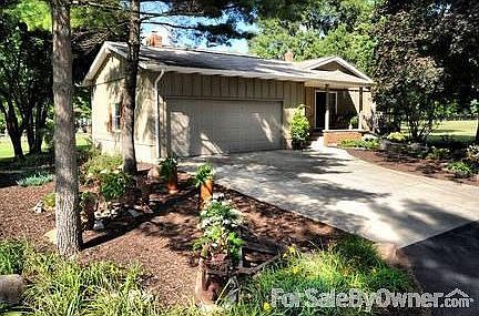 Approach to Garage
						:
						Concrete approach provides parking for 4 cars.
Shade gardens on both sides.