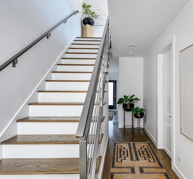 Second floor, showing stairs to 3rd floor loft space and rooftop