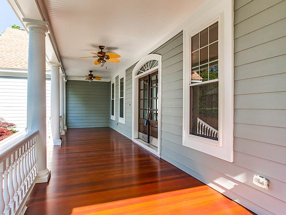 Wide front porch with fans