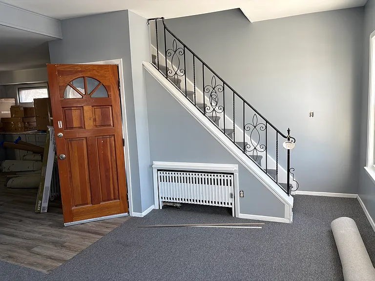 Living room and apartment entrance door