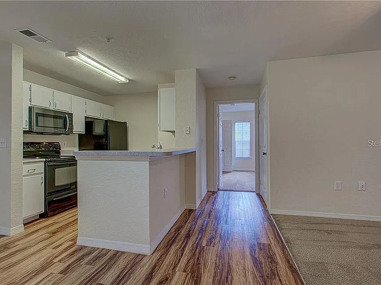 8917 Manor Loop #104 — Photo 7