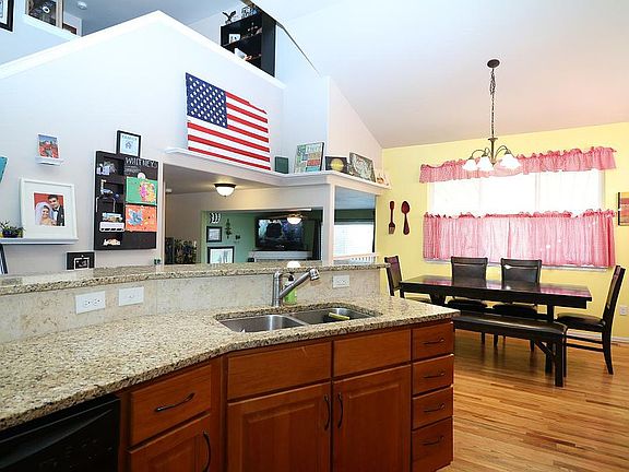 Open Concept Kitchen with Vaulted Ceilings
