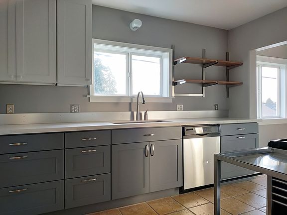 Renovated kitchen with Quartz counter tops and stainless appliances