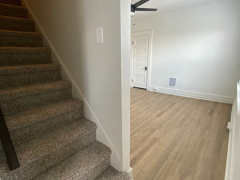 Stair to third floor/living room