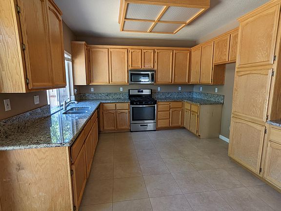 tile kitchen flooring with granite counter top