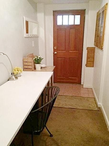 entryway to English basement apartment