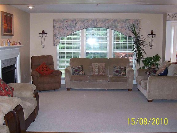 Family room rear end. However, now it has hardwood flooring!