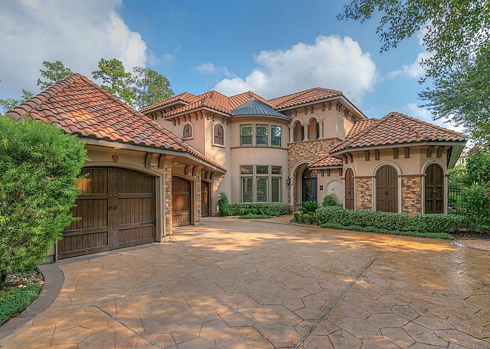 Gorgeous Goshy Custom Home in prestigious Carton Woods Creekside has numerous amenities including an oversized three car garage!