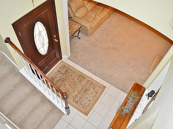 view from upstairs looking down at the entry way.