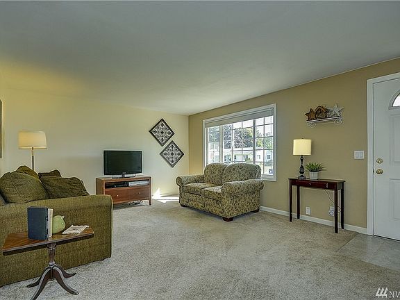 Living room, light and bright with newer windows!