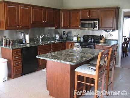 Kitchen with custom granite counters