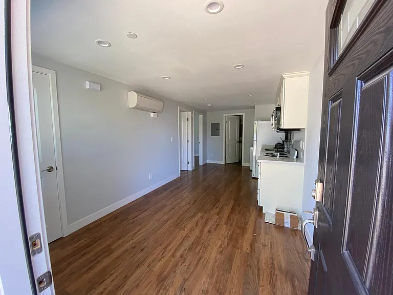 View of living room and kitchen