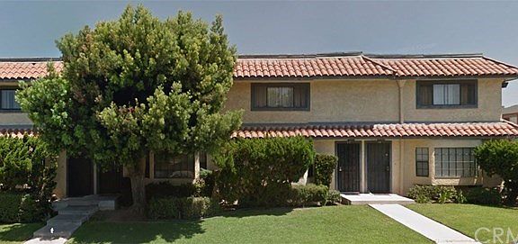 End unit home at right side of photo, with your own grass lawn front yard!