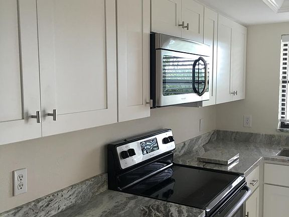 custom cabinets, all new stainless appliances
