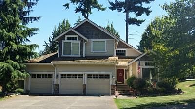 LOVELY HOME ON CORNER LOT IN GATED COMMUNITY