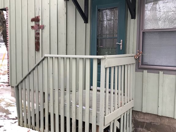 Side entrance-paved driveway