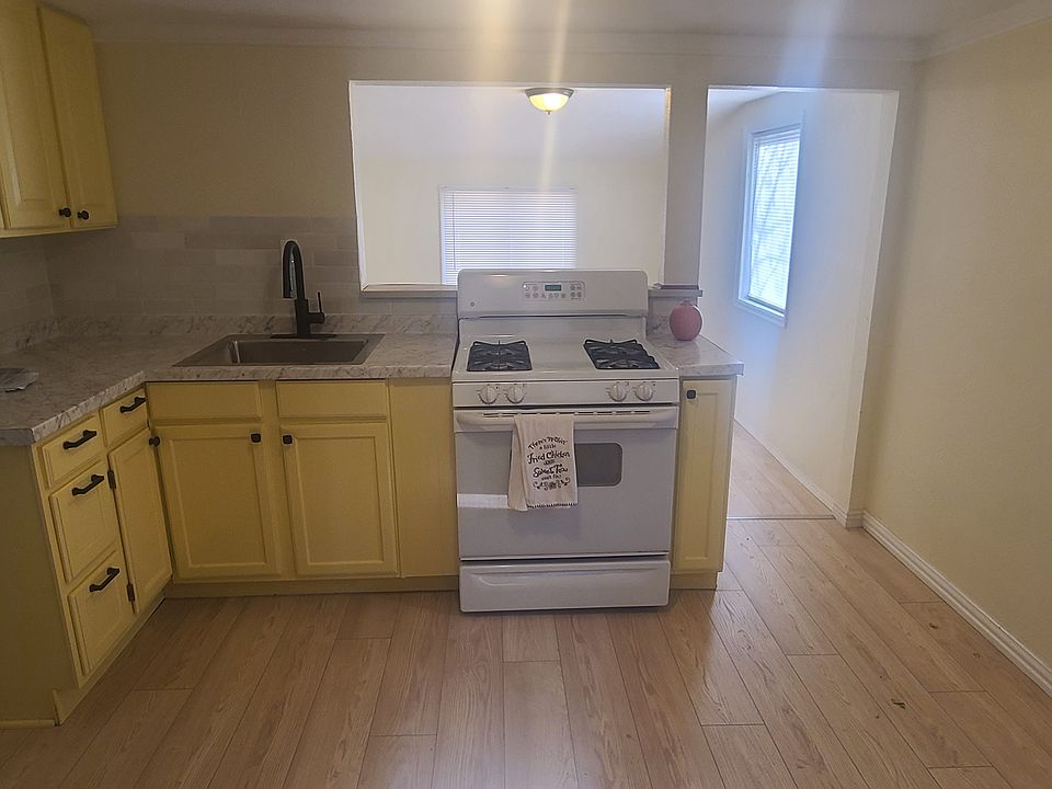 Freshly painted kitchen w gas stove