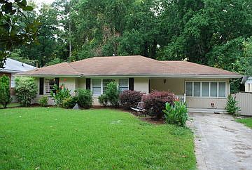 Front of house with long driveway