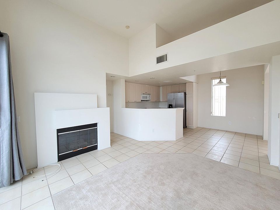 Top floor corner unit means this bright and airy unit has vaulted ceilings throughout the condo