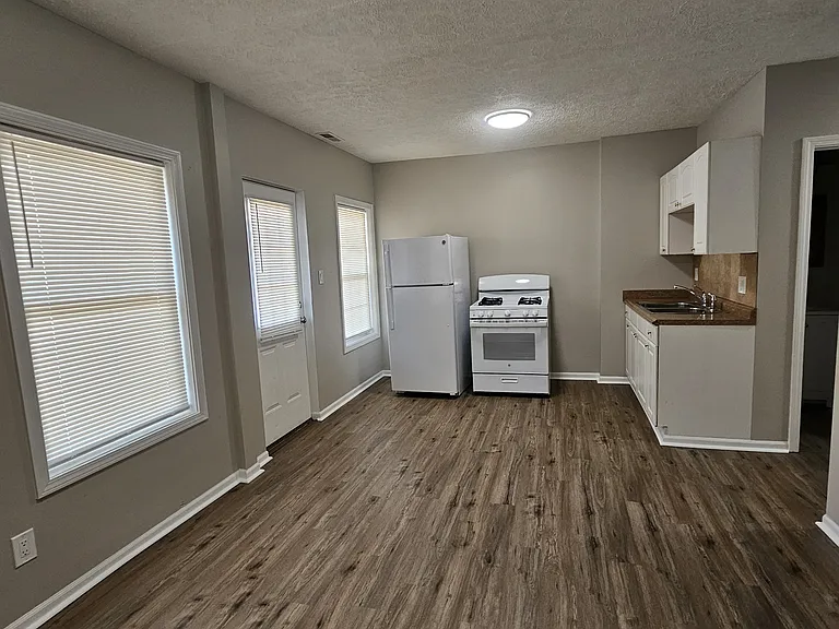 The open plan gives you plenty pf room for a kitchen table and living room furniture.