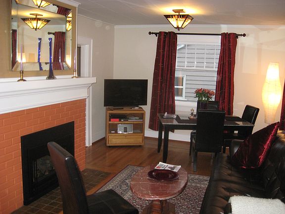LR, oak floors & fireplace.
