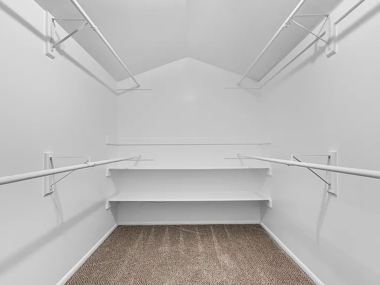 Primary Bedroom walk-in closet