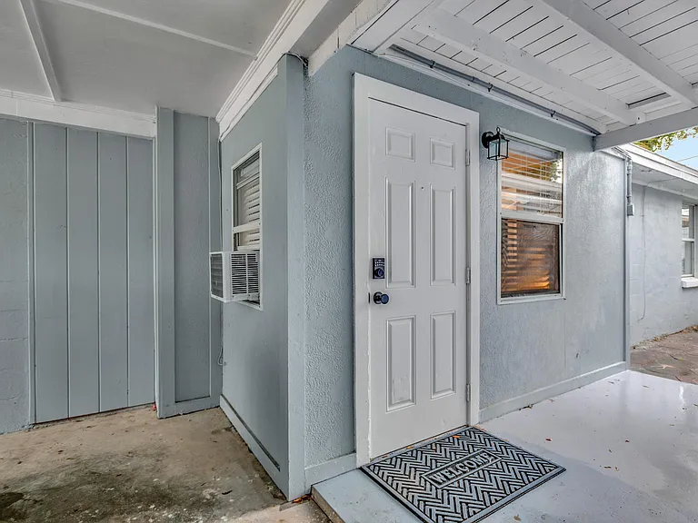Private covered entrance, especially convenient next to where you pull up your car and useful when it rains.