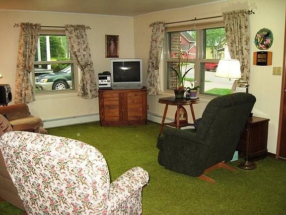 Bright living room with south and east facing windows