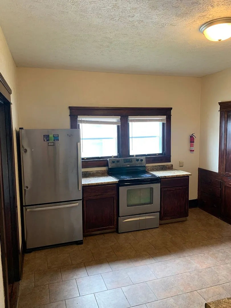 Great 4 Bed Home! Charming Original Wood Features! (can house 5) **August 2027** — Photo 3