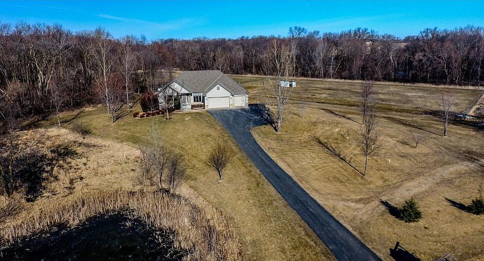 Welcome to this stunning Rambler on 19 acres of privacy!