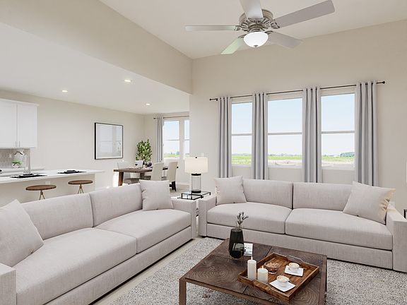 Kick your feet up after a long day in your cozy living space.
