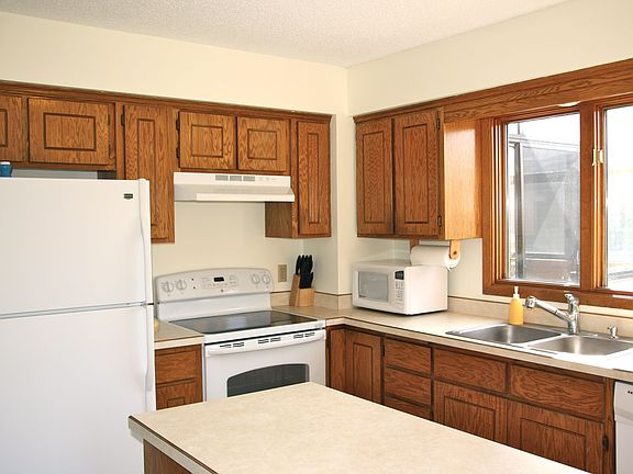 Great Kitchen with center island and newer appliances and flooring.