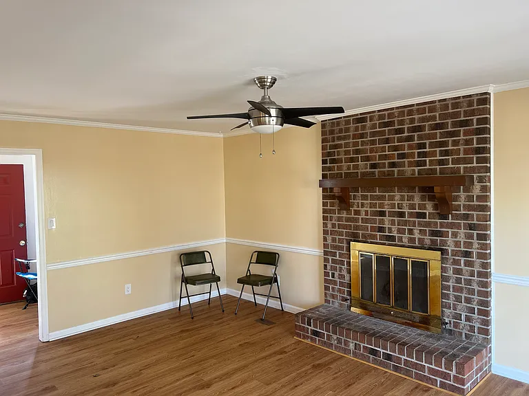 Den with fireplace