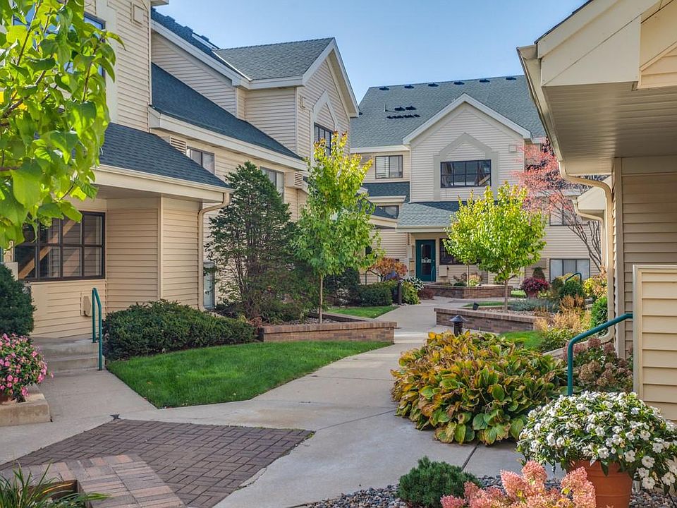 Walk through a beautifully landscaped courtyard to arrive at