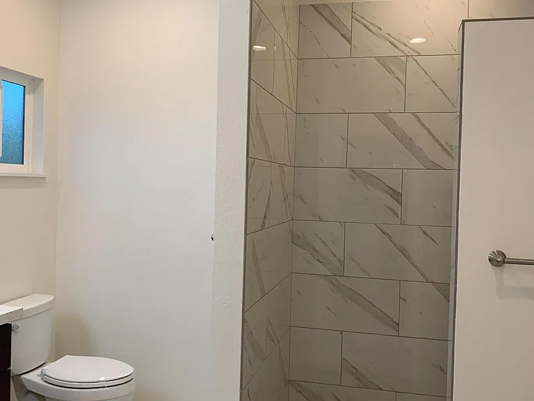 master bathroom with walk-in shower