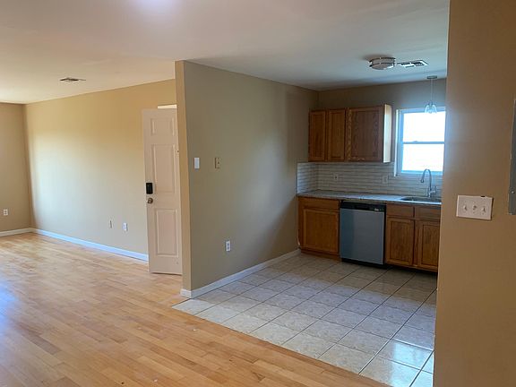 Sunlit kitchen and living room