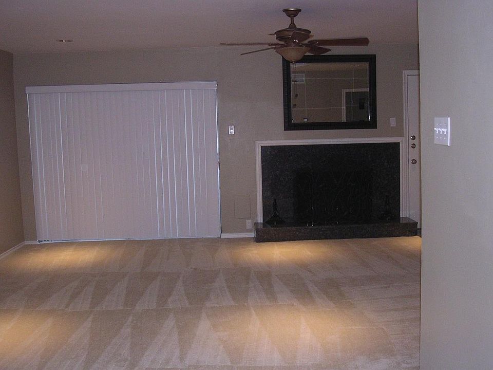 Living room w/ faux fire place