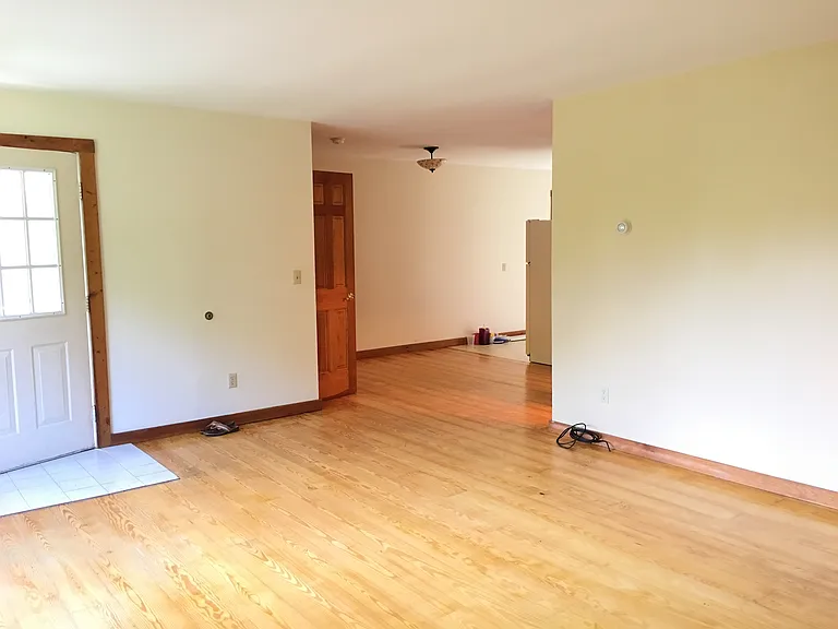 View of entrance and dining area from living room