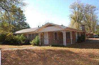 Side view of 3029 Grand in AISD.