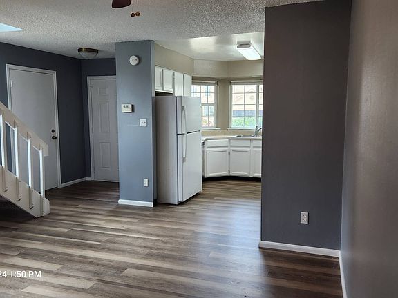 Front entrance, and a door to the garage