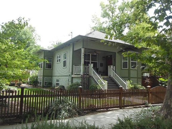 Home sits on a very large downtown lot!