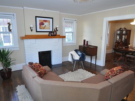 Spacious Living Room with Hardwoods & Fireplace