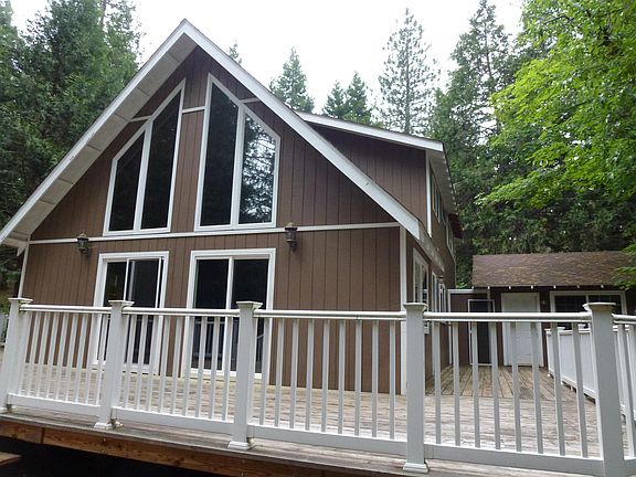 side of house and a peek on the right side of the mother-in-law unit