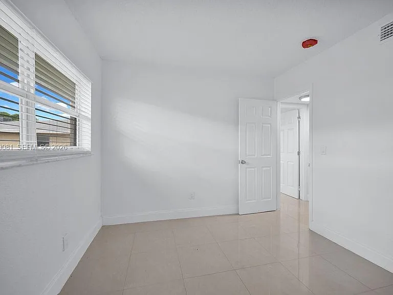 6953 SW 7th St — Photo 13