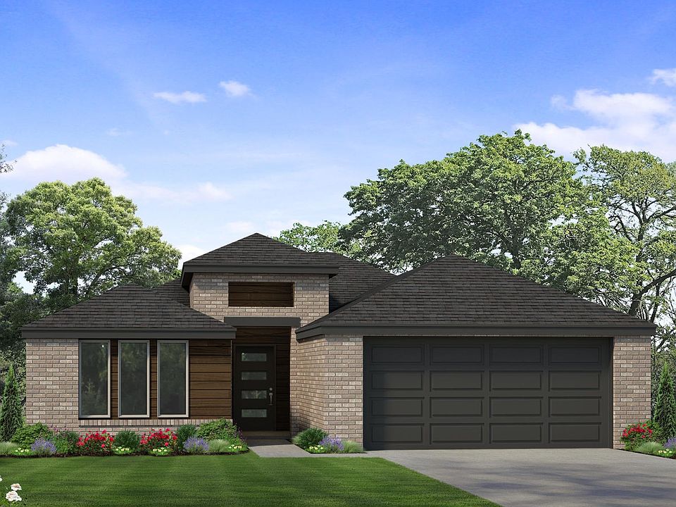 Modern single-story house with a brick and wood exterior, dark gray roof, and two-car garage. Surrou